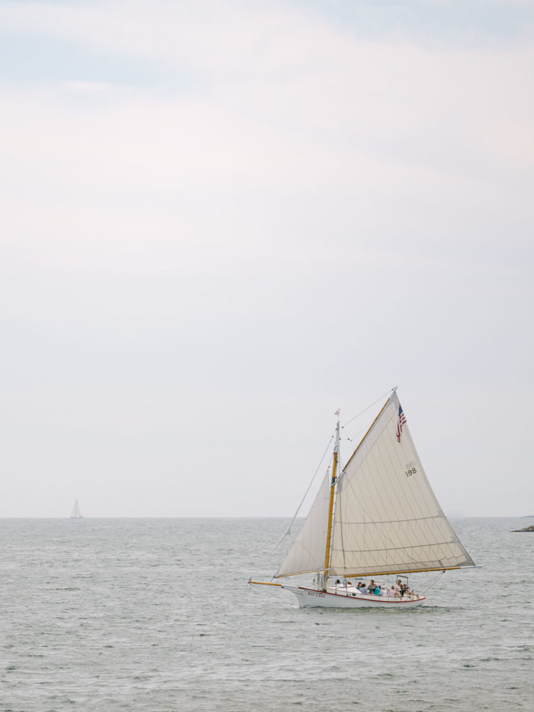 a sail boat with plenty of tourist